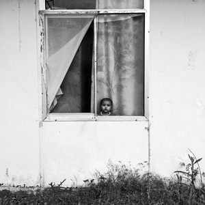 A child behind the window  Ali Shams